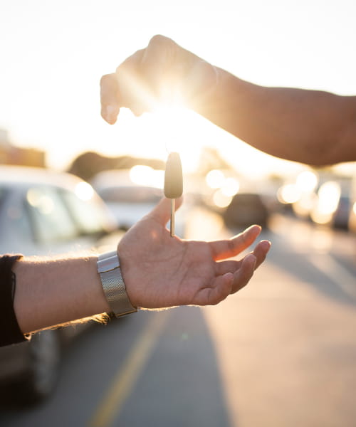 Car keys being handed over