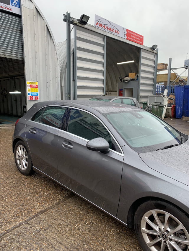 The new door installed on the Mercedes