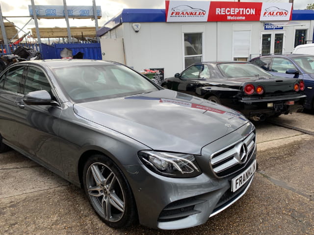 The after picture with the Mercedes and the repaired bonnet