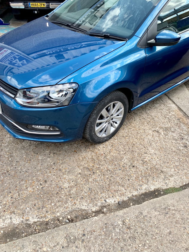 The finished result of the Volkswagen's repaired bumper and wing