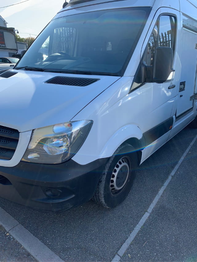 The repaired wing of the Mercedes van